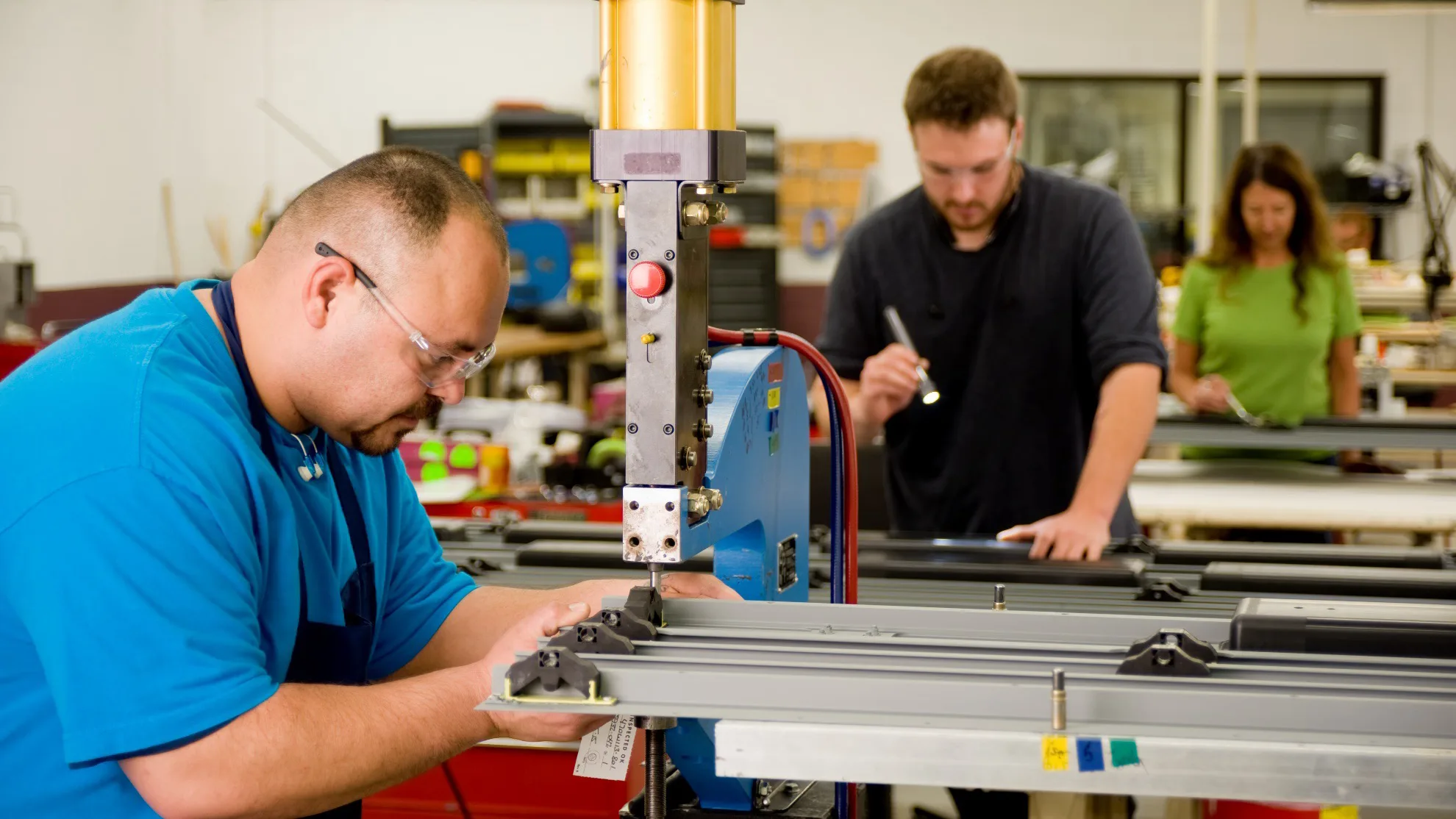 Workers machining aerospace parts quality inspection